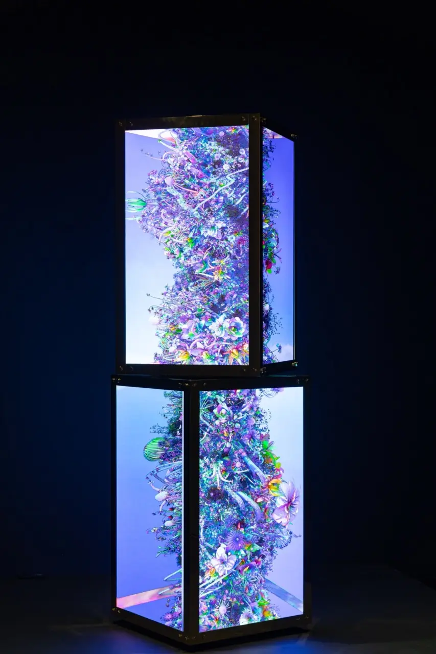Exponential Growth, two stacked screen structures filled with evolving botanical imagery