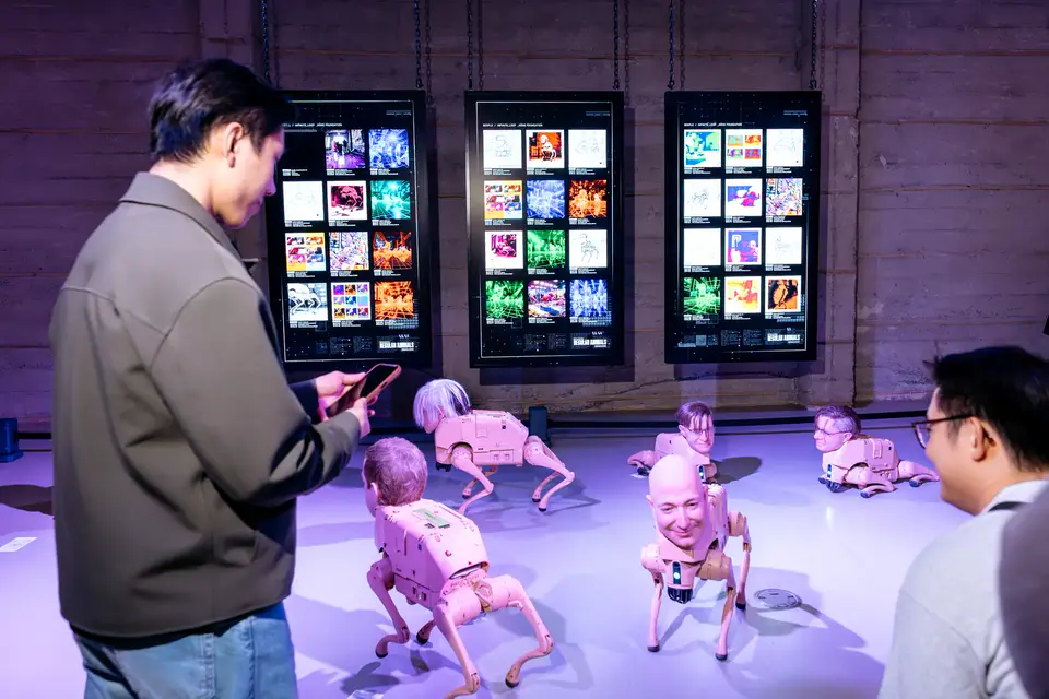 Regular Animals robot dogs on view with visitors